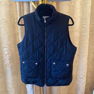 Black quilted puffy vest